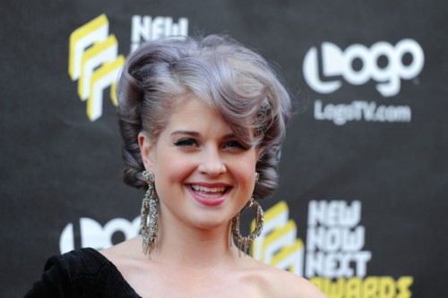 Kelly Osborne Photo of a young pale skinned young woman with platinum/ purple toned hair.