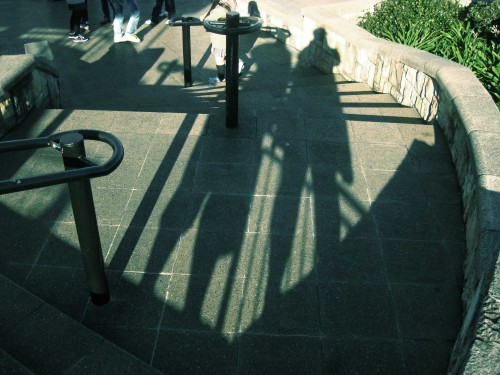 Photo of the long stretched afternoon shadows of Nick and I.