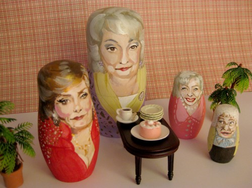 A set of matryoshka dolls each painted to look like the four women on Golden Girls.