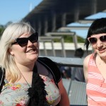 Photo of Zoe and Sonya on the bridge, laughing.
