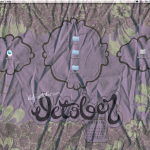 The preview of my desktop for October in action - Purple scrunched up silk with pale green paisley doodling around the borders and October written in chunky script.