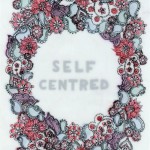 A drawing on several layers of film of lots of little paisley and flower shapes forming a border around the words "SELF CENTRED". Colour from the lower layers fills the paisley and flower shapes in reds, purples and greens.