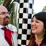 Nick and I talking and laughing next to a checkerboard patterned pole.