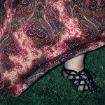 A photo of my red maxi skirt billowing out around my legs.