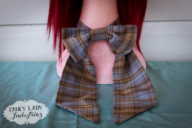 Cheryl is too skinny to fill out a dapper tie :(