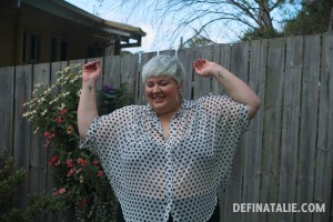 A photo of me with, yep, my arms up in the air milking the fabulous oversized sheerness of my blouse.
