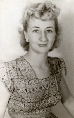 Nana in 1946 at 20, wearing a cute square neck dress and a curled fringe.