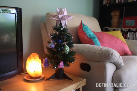 Our tiny giftmas tree with papercraft gems and rock salt lamp.