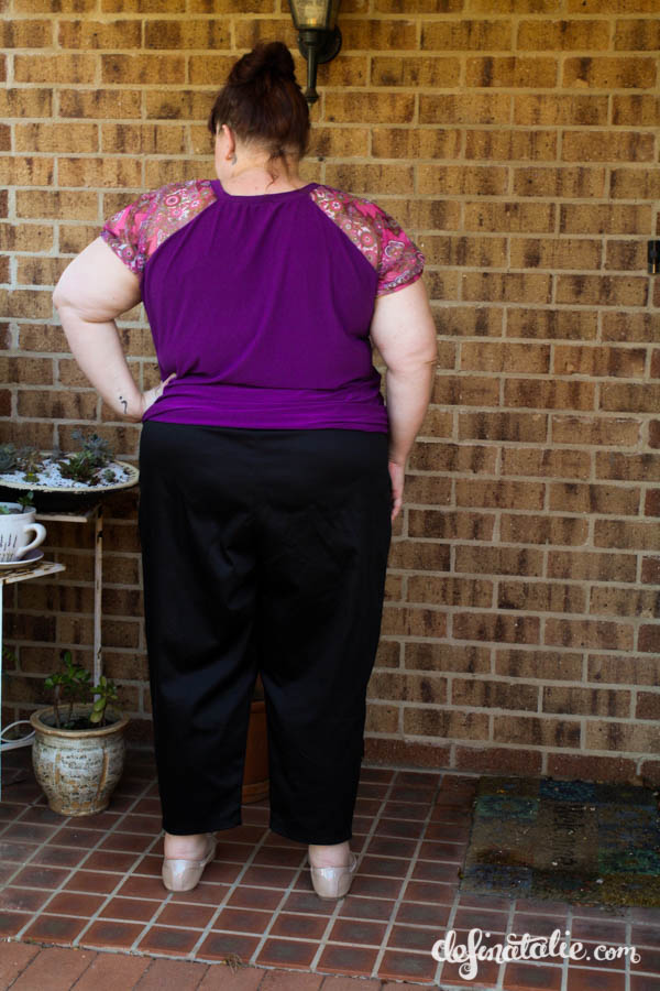 The back view shows that some of my fit problems are gone, but I have knee lines!